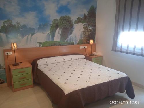 Llit o llits en una habitació de Hotel Restaurante Caracho