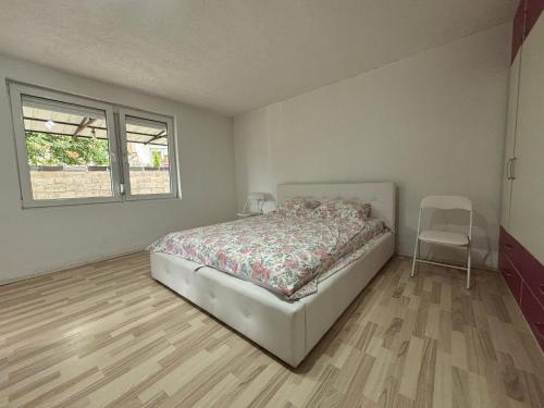 Ένα ή περισσότερα κρεβάτια σε δωμάτιο στο Martin Apartments Ohrid