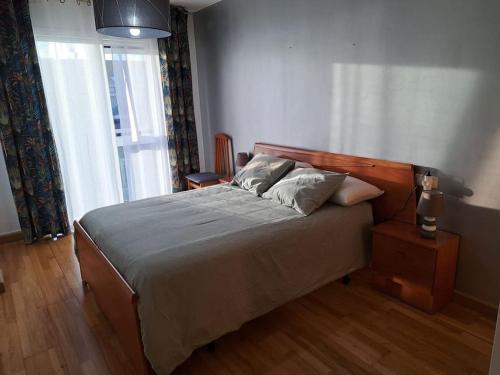 Ένα ή περισσότερα κρεβάτια σε δωμάτιο στο Apartamento en Rianxo La Morenita