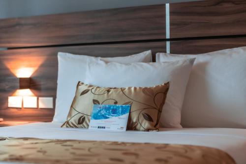 Postel nebo postele na pokoji v ubytování Sleep Inn Tijuana