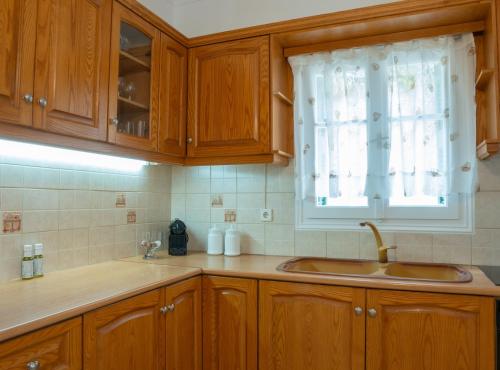 Η κουζίνα ή μικρή κουζίνα στο Bay View Villa