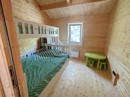 Postel nebo postele na pokoji v ubytování Chalet "Le Ressourcé"