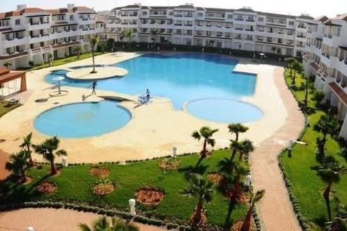 Bazén v ubytování Complex garden beach2 sidi rahal nebo v jeho okolí