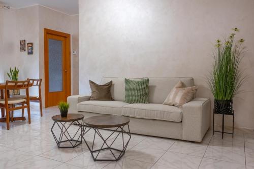 a living room with a couch and a table at Casa Vacanze Dolce Vita in Termoli