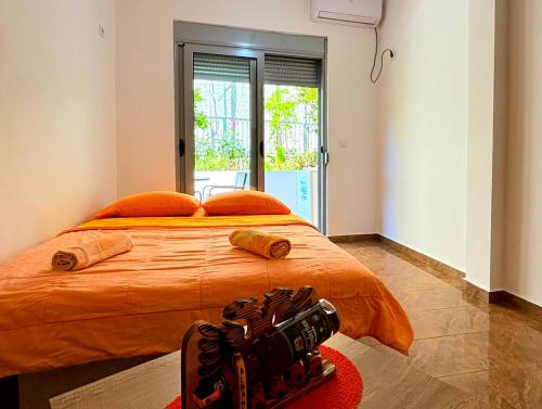 En eller flere senge i et værelse på Mala Plaza Apartments - NEW