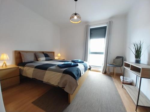 En eller flere senge i et værelse på Azores Physis Apartment - sea view