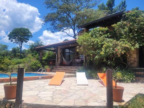 a resort with a pool and a house at La Soñada San Bernardino in San Bernardino