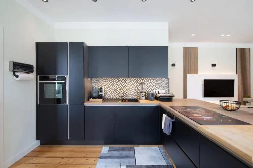 Kuchyň nebo kuchyňský kout v ubytování Ferienwohnung Nippesstr 17 in Ohligs