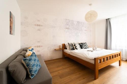Postel nebo postele na pokoji v ubytování Family Apartment Grohova