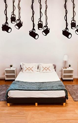 Ένα ή περισσότερα κρεβάτια σε δωμάτιο στο Casa dos artistas