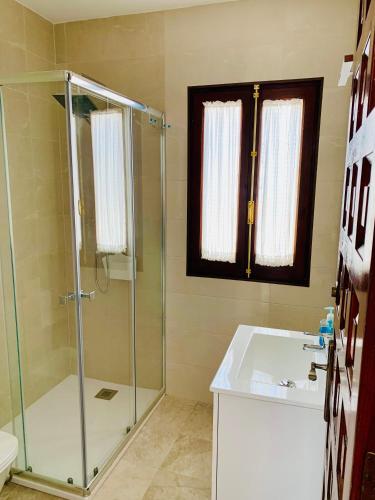 a bathroom with a shower and a sink at LA BARRACA - A - Relax, Terraza cerca del mar in Mojácar