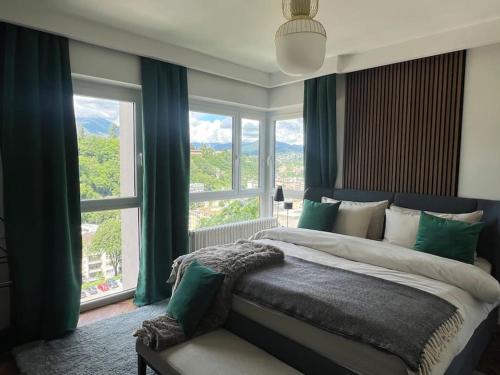 Postel nebo postele na pokoji v ubytování Panorama Suite in Lugano - Pazzallo