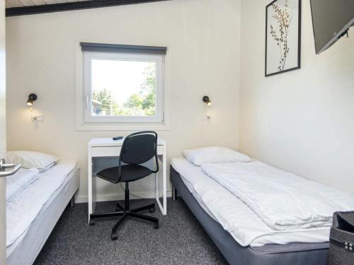 Postel nebo postele na pokoji v ubytování Holiday home Tarm LXXIX