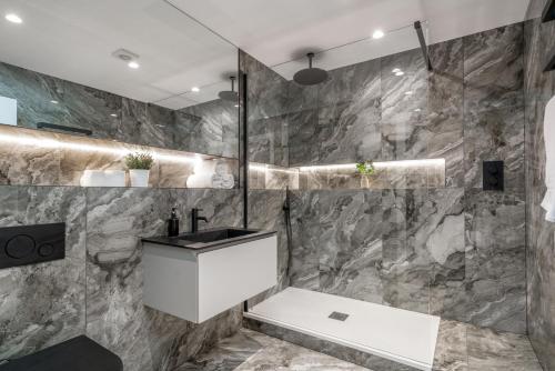 a bathroom with a sink and a shower at Skyvillion -COZY & AMAZING King 1Bed Apartment in London Cockfosters Mins to Tube in Cockfosters