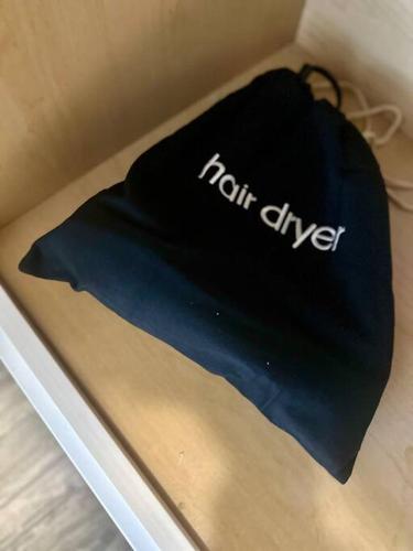 a black bag sitting on top of a table at Rotonda Pool Oasis Near Beaches - Sleeps 9 in Rotonda West