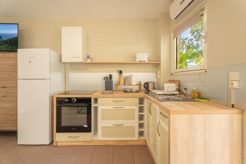 Köök või kööginurk majutusasutuses Appartement Macaron Clair