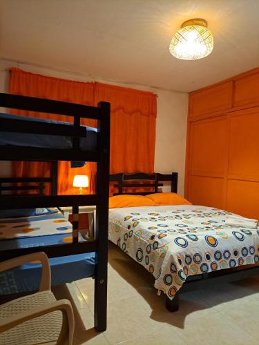 a bedroom with two bunk beds at Hostel Shalom Adonai in Cartagena de Indias