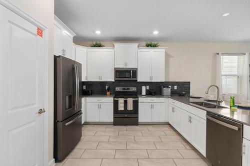 8 Bedroom Home inside the best resort in Orlando! photo 17