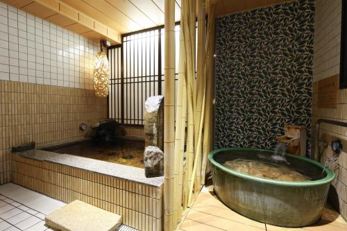 A bathroom at Dormy Inn Chiba City Soga