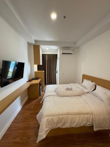 Postel nebo postele na pokoji v ubytování Permata Residence Apartment unit 806, Baloi