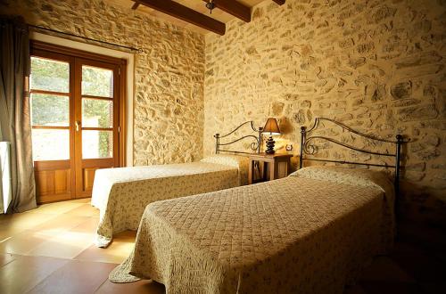 Кровать или кровати в номере Country house in a peaceful rural setting for large groups