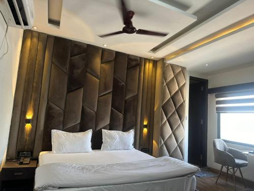 Postel nebo postele na pokoji v ubytování Hotel Kritika