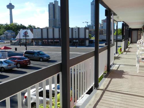 a balcony with a view of a parking lot at Kings Inn Near the Falls in Niagara Falls