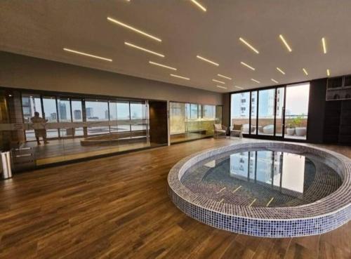 Πισίνα στο ή κοντά στο Departamento lujoso en Sky Elite