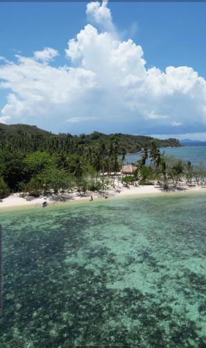a view of an island in the ocean at Dosplaya Ecocamp in El Nido