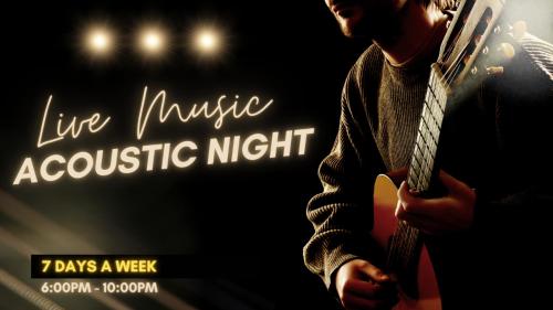 a man playing an acoustic guitar in a concert at Reca Resort and Spa in Porac