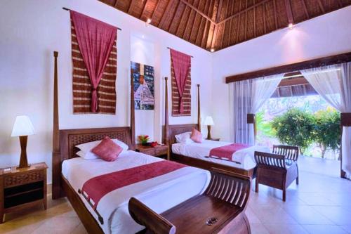 Katil atau katil-katil dalam bilik di Damian 4 BR Pool Villa Garden JU24
