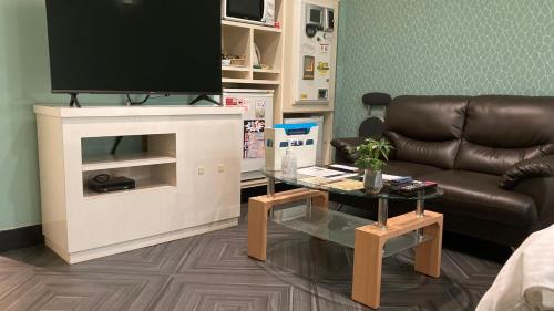 TV a/nebo společenská místnost v ubytování Valentine (Adult Only)