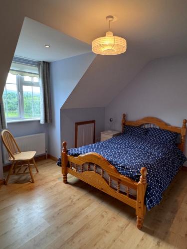 Rúm í herbergi á Clare Homestay