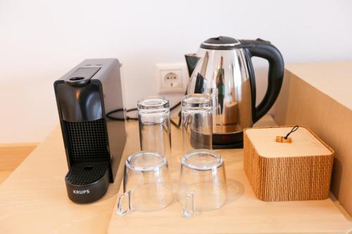 Příslušenství pro přípravu čaje a kávy v ubytování Anassa Suites