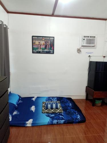 a mattress on the floor in a room at Tiny House we call Love Shack in Panglao
