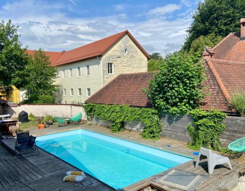 Бассейн в Bäckerhaus - Wohnung mit Pool und Garten или поблизости