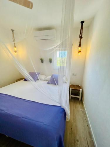 Cama o camas de una habitación en Can Chumbera Formentera