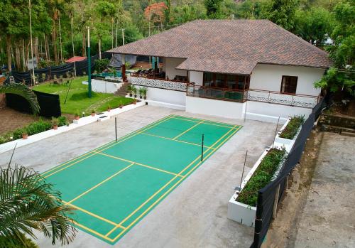 an aerial view of a tennis court in a house at Tranquil Resort - Blusalzz Collection, Wayanad - Kerala in Ambalavayal