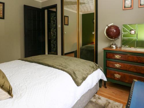 Ein Bett oder Betten in einem Zimmer der Unterkunft Mo Dhachaidh