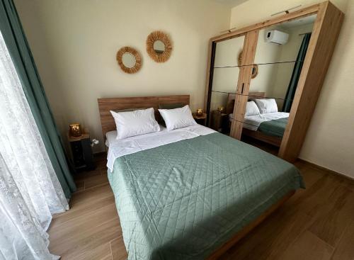 Postel nebo postele na pokoji v ubytování Gouvia Hideaway