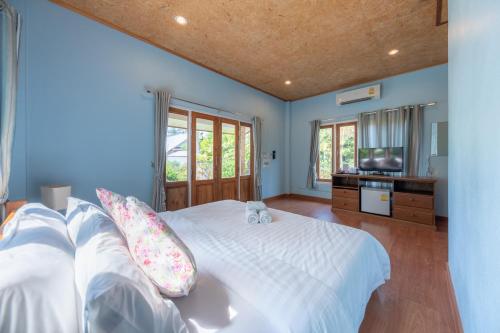 Postel nebo postele na pokoji v ubytování Seafar Resort
