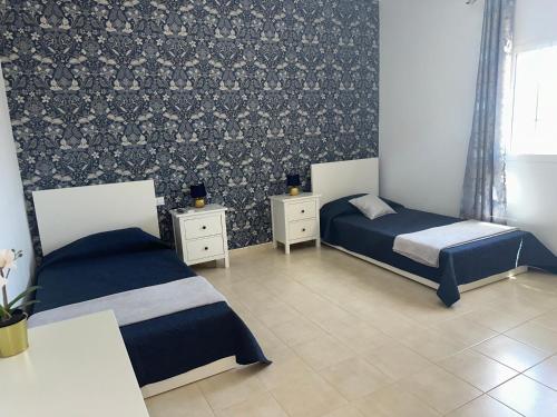 Ένα ή περισσότερα κρεβάτια σε δωμάτιο στο Casita 7 Islas