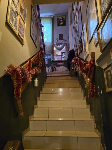 a staircase in a house with christmas decorations at Hostel Apollo in Ząbkowice Śląskie