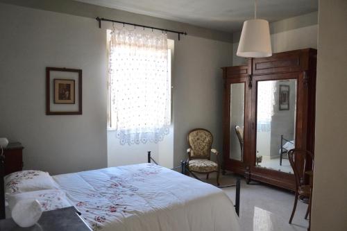 Postel nebo postele na pokoji v ubytování B&B I Due Gelsi
