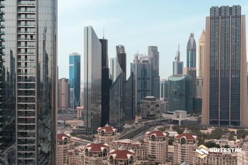 a view of a city with many tall buildings at Fashion avenue Dubai Mall -The Residence in Dubai