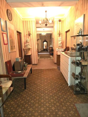a hallway of a building with a room with a room at Hostel Apollo in Ząbkowice Śląskie