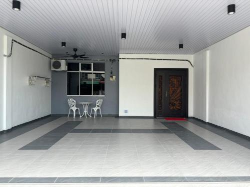 Φωτογραφία από το άλμπουμ του 126 Homestay TYPE C σε Tangkak