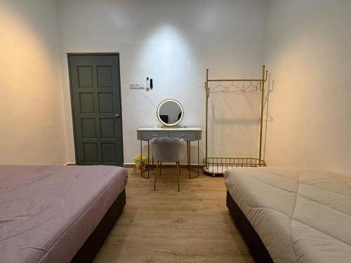 Ένα ή περισσότερα κρεβάτια σε δωμάτιο στο 126 Homestay TYPE C