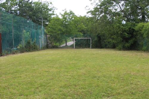 a soccer field with a goal in a field at [vista Sibillini] Villa Amici in Verri