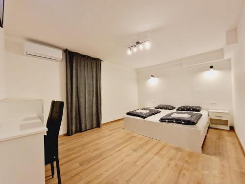 Postel nebo postele na pokoji v ubytování Room D